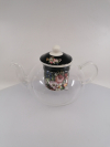 Sklenený čajník s porcelánovým čiernym filtrom, kvetiny